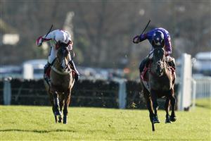 SUNBURY, ENGLAND - DECEMBER 26: Aidan Coleman riding Paisley Park (R) clear the last to win The Ladbrokes Long Walk Hurdle at Kempton Park Racecourse on December 26, 2022 in Sunbury, England. (Photo by Alan Crowhurst/Getty Images)