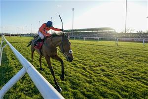 SUNBURY, ENGLAND - DECEMBER 26: Harry Cobden riding Bravemansgame clear the last to win The Ladbrokes King George VI Chase at Kempton Park Racecourse on December 26, 2022 in Sunbury, England. (Photo by Alan Crowhurst/Getty Images)