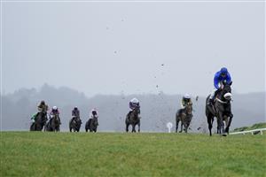 CHEPSTOW, WALES - DECEMBER 27: Adam Wedge riding Out Of Office (R) win The Coral Committed To Safer Gambling Novices