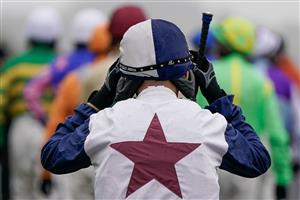 CHEPSTOW, WALES - DECEMBER 27: Jockeys make their way to the parade ring at Chepstow Racecourse on December 27, 2022 in Chepstow, Wales. (Photo by Alan Crowhurst/Getty Images)