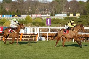 DUBLIN, IRELAND - DECEMBER 29: Paul Townend riding State Man win The Matheson Hurdle from Vauban and Danny Mullins at Leopardstown Racecourse on December 29, 2022 in Dublin, Ireland (Photo by Alan Crowhurst/Getty Images)