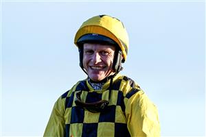 DUBLIN, IRELAND - DECEMBER 29: Paul Townend celebrates after riding State Man to win The Matheson Hurdle at Leopardstown Racecourse on December 29, 2022 in Dublin, Ireland (Photo by Alan Crowhurst/Getty Images)