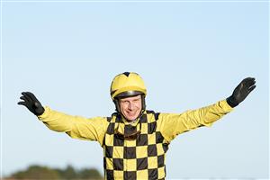 DUBLIN, IRELAND - DECEMBER 29: Paul Townend celebrates after riding State Man to win The Matheson Hurdle at Leopardstown Racecourse on December 29, 2022 in Dublin, Ireland (Photo by Alan Crowhurst/Getty Images)