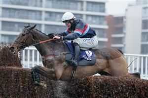 NEWBURY, ENGLAND - DECEMBER 31: Charlie Deutsch riding Gamaret clear the last to win The Coral First For Horse Racing Handicap Chase at Newbury Racecourse on December 31, 2022 in Newbury, England. (Photo by Alan Crowhurst/Getty Images)