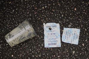 CHELTENHAM, ENGLAND - JANUARY 01: Losing betting tickets and an empty pint of Guinness lay on the floor near the bookmakers at Cheltenham Racecourse on January 01, 2023 in Cheltenham, England. (Photo by Alan Crowhurst/Getty Images)