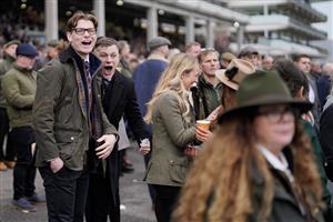 CHELTENHAM, ENGLAND - JANUARY 01: Racegoers delight at a winner at Cheltenham Racecourse on January 01, 2023 in Cheltenham, England. (Photo by Alan Crowhurst/Getty Images)