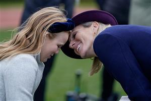 CHELTENHAM, ENGLAND - JANUARY 01: Zara Tindall (R) attends the races with daughter Mia Tindall at Cheltenham Racecourse on January 01, 2023 in Cheltenham, England. (Photo by Alan Crowhurst/Getty Images)