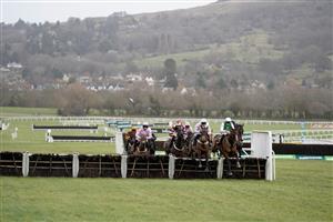 CHELTENHAM, ENGLAND - JANUARY 01: Sam Twiston-Davies riding Weveallbeencaught (R, green/white) on their way to winning The Ballymore Maiden Hurdle at Cheltenham Racecourse on January 01, 2023 in Cheltenham, England. (Photo by Alan Crowhurst/Getty Images)