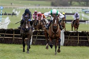 CHELTENHAM, ENGLAND - JANUARY 01: Sam Twiston-Davies riding Weveallbeencaught (green/white) clear the last to win The Ballymore Maiden Hurdle at Cheltenham Racecourse on January 01, 2023 in Cheltenham, England. (Photo by Alan Crowhurst/Getty Images)