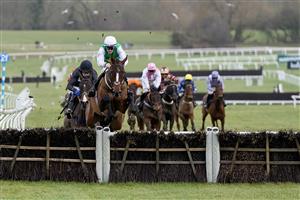 CHELTENHAM, ENGLAND - JANUARY 01: Sam Twiston-Davies riding Weveallbeencaught (green/white) clear the last to win The Ballymore Maiden Hurdle at Cheltenham Racecourse on January 01, 2023 in Cheltenham, England. (Photo by Alan Crowhurst/Getty Images)