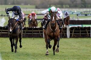 CHELTENHAM, ENGLAND - JANUARY 01: Sam Twiston-Davies riding Weveallbeencaught (green/white) clear the last to win The Ballymore Maiden Hurdle at Cheltenham Racecourse on January 01, 2023 in Cheltenham, England. (Photo by Alan Crowhurst/Getty Images)