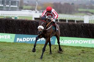 CHELTENHAM, ENGLAND - JANUARY 01: Sam Twiston-Davies riding The Real Whacker clear the last to win The Paddy Power Novices