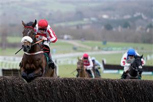 CHELTENHAM, ENGLAND - JANUARY 01: Sam Twiston-Davies riding The Real Whacker clear the last to win The Paddy Power Novices
