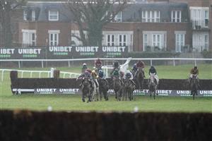 ESHER, ENGLAND - JANUARY 07: Alex Edwards riding Wishing And Hoping (L, grey/maroon) lead all the way to win The Unibet Veterans' Handicap Chase at Sandown Park on January 07, 2023 in Esher, England. (Photo by Alan Crowhurst/Getty Images)