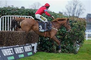 ESHER, ENGLAND - JANUARY 07: Marc Goldstein riding Certainly Red clear the last to win The Read Nicky Henderson's Unibet Blog Handicap Chase at Sandown Park on January 07, 2023 in Esher, England. (Photo by Alan Crowhurst/Getty Images)