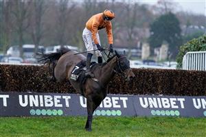 ESHER, ENGLAND - JANUARY 07: Ciaran Gethings at the last riding Gladiateur Allen during The Unibet Horserace Betting Operator Of The Year Handicap Chase at Sandown Park on January 07, 2023 in Esher, England. (Photo by Alan Crowhurst/Getty Images)