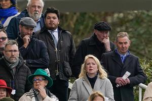 ESHER, ENGLAND - JANUARY 07: A worried looking Gary Moore bites his nails as he watches Authorised Speed during The Unibet Tolworth Novices' Hurdle at Sandown Park on January 07, 2023 in Esher, England. (Photo by Alan Crowhurst/Getty Images)