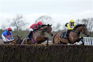 WARWICK, ENGLAND - JANUARY 14: Harry Skelton riding Galia Des Liteaux (R) on their way to winning The eventmasters.co.uk Hampton Novices