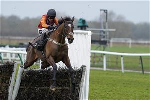 WARWICK, ENGLAND - JANUARY 14: Tom Cannon riding Non Stop clear the last to win The Mark Jackson & Neil Keenan Memorial Novices