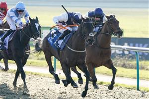LINGFIELD, ENGLAND - JANUARY 21: Tom Marquand riding Obsidian Knight (blue/cream cap) win The Huge Daily Boosts Only At BetUK Handicap at Lingfield Park on January 21, 2023 in Lingfield, England. (Photo by Alan Crowhurst/Getty Images)