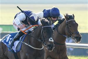 LINGFIELD, ENGLAND - JANUARY 21: Tom Marquand riding Obsidian Knight (blue/cream cap) win The Huge Daily Boosts Only At BetUK Handicap at Lingfield Park on January 21, 2023 in Lingfield, England. (Photo by Alan Crowhurst/Getty Images)