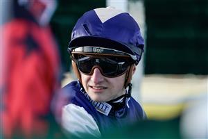 LINGFIELD, ENGLAND - JANUARY 21: Tom Marquand in the stalls at Lingfield Park on January 21, 2023 in Lingfield, England. (Photo by Alan Crowhurst/Getty Images)