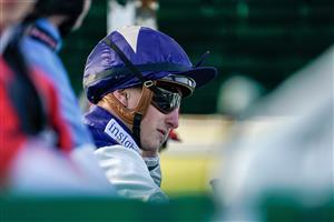 LINGFIELD, ENGLAND - JANUARY 21: Tom Marquand in the stalls at Lingfield Park on January 21, 2023 in Lingfield, England. (Photo by Alan Crowhurst/Getty Images)
