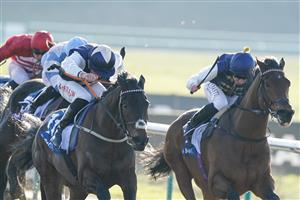 LINGFIELD, ENGLAND - JANUARY 21: Tom Marquand riding Obsidian Knight (blue/cream cap) win The Huge Daily Boosts Only At BetUK Handicap at Lingfield Park on January 21, 2023 in Lingfield, England. (Photo by Alan Crowhurst/Getty Images)