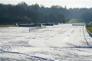 LINGFIELD, ENGLAND - JANUARY 21: Frost covers on the National Hunt course at Lingfield Park on January 21, 2023 in Lingfield, England. (Photo by Alan Crowhurst/Getty Images)