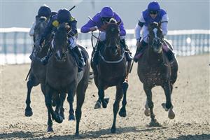 LINGFIELD, ENGLAND - JANUARY 21: Hayley Turner riding Harry Brown (yellow spots) win The talkSPORT Powered By Fans Handicap at Lingfield Park on January 21, 2023 in Lingfield, England. (Photo by Alan Crowhurst/Getty Images)