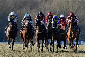 LINGFIELD, ENGLAND - JANUARY 21: Luke Morris riding First Emperor (C, red cap) win The BetUK's Acca Club 5 Free Bet Handicap at Lingfield Park on January 21, 2023 in Lingfield, England. (Photo by Alan Crowhurst/Getty Images)