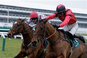 CHELTENHAM, ENGLAND - JANUARY 28: Derek Fox riding Ahoy Senor (red) clear the last to win The Paddy Power Cotswold Chase at Cheltenham Racecourse on January 28, 2023 in Cheltenham, England. (Photo by Alan Crowhurst/Getty Images)