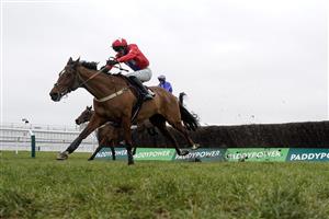 CHELTENHAM, ENGLAND - JANUARY 28: Niall Houlihan riding Editeur Du Gite clear the last to win The Albert Bartlett Clarence House Chase at Cheltenham Racecourse on January 28, 2023 in Cheltenham, England. (Photo by Alan Crowhurst/Getty Images)