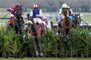 CHELTENHAM, ENGLAND - JANUARY 28: Sean Bowen riding Back On The Lash (red/white cap) clear the last to win The Glenfarclas Cross Country Handicap Chase at Cheltenham Racecourse on January 28, 2023 in Cheltenham, England. (Photo by Alan Crowhurst/Getty Images)