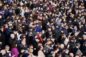 DUBLIN, IRELAND - FEBRUARY 04: A large crowd watch the parade ring at Leopardstown Racecourse on February 04, 2023 in Dublin, Ireland. (Photo by Alan Crowhurst/Getty Images)