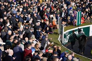DUBLIN, IRELAND - FEBRUARY 04: A large crowd watch the parade ring at Leopardstown Racecourse on February 04, 2023 in Dublin, Ireland. (Photo by Alan Crowhurst/Getty Images)