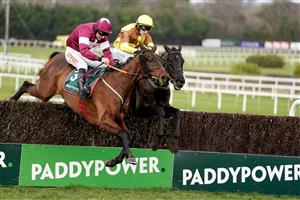 DUBLIN, IRELAND - FEBRUARY 04: Paul Townend riding Galopin Des Champs (R) clear the last to win The Paddy Power Irish Gold Cup at Leopardstown Racecourse on February 04, 2023 in Dublin, Ireland. (Photo by Alan Crowhurst/Getty Images)