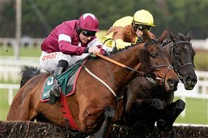 DUBLIN, IRELAND - FEBRUARY 04: Paul Townend riding Galopin Des Champs (R) clear the last to win The Paddy Power Irish Gold Cup at Leopardstown Racecourse on February 04, 2023 in Dublin, Ireland. (Photo by Alan Crowhurst/Getty Images)