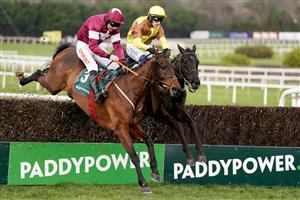 DUBLIN, IRELAND - FEBRUARY 04: Paul Townend riding Galopin Des Champs (R) clear the last to win The Paddy Power Irish Gold Cup at Leopardstown Racecourse on February 04, 2023 in Dublin, Ireland. (Photo by Alan Crowhurst/Getty Images)