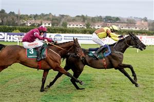DUBLIN, IRELAND - FEBRUARY 04: Paul Townend riding Galopin Des Champs (R) clear the last to win The Paddy Power Irish Gold Cup at Leopardstown Racecourse on February 04, 2023 in Dublin, Ireland. (Photo by Alan Crowhurst/Getty Images)
