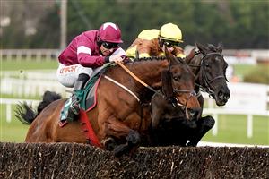 DUBLIN, IRELAND - FEBRUARY 04: Paul Townend riding Galopin Des Champs (R) clear the last to win The Paddy Power Irish Gold Cup at Leopardstown Racecourse on February 04, 2023 in Dublin, Ireland. (Photo by Alan Crowhurst/Getty Images)
