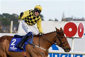 DUBLIN, IRELAND - FEBRUARY 05: Paul Townend riding State Man win The Chanelle Pharma Irish Champion Hurdle at Leopardstown Racecourse on February 05, 2023 in Dublin, Ireland. (Photo by Alan Crowhurst/Getty Images)