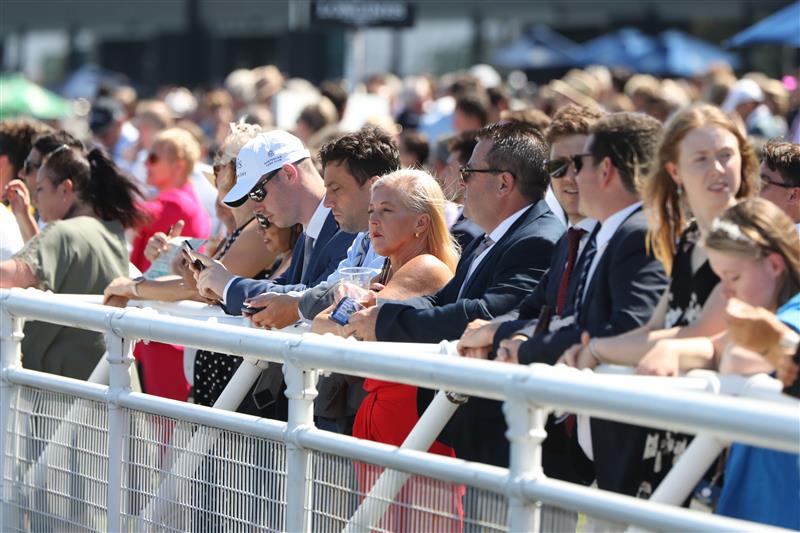 SYDNEY, AUSTRALIA - FEBRUARY 11: Racegoers watch on during the Inglis Millennium Day - Sydney Racing at Royal Randwick Racecourse on February 11, 2023 in Sydney, Australia. (Photo by Jeremy Ng/Getty Images)