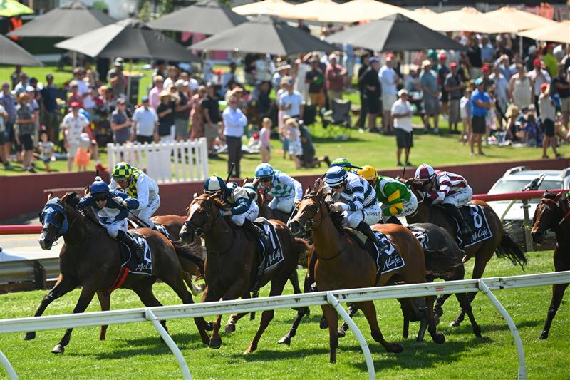 MELBOURNE, AUSTRALIA - FEBRUARY 11: Craig Newitt riding Lofty Strike defeats Damian Lane riding Uncommon James and Marine One (ctr) in Race 6, the Mccafe Rubiton Stakes, during Melbourne Racing at Sandown Hillside on February 11, 2023 in Melbourne, Australia. (Photo by Vince Caligiuri/Getty Images)