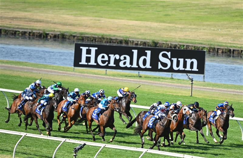 MELBOURNE, AUSTRALIA - FEBRUARY 11: Jamie Kah riding Pounding winning Race 8, The Big Screen Company T.s. Carlyon Cup, during Melbourne Racing at Sandown Hillside on February 11, 2023 in Melbourne, Australia. (Photo by Vince Caligiuri/Getty Images)