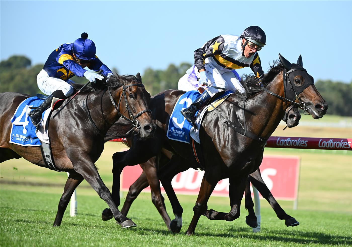 MELBOURNE, AUSTRALIA - FEBRUARY 11: Damien Oliver riding Here To Shock defeats Ben Melham riding Munhamek in Race 9, the Tile Importer Handicap, during Melbourne Racing at Sandown Hillside on February 11, 2023 in Melbourne, Australia. (Photo by Vince Caligiuri/Getty Images)