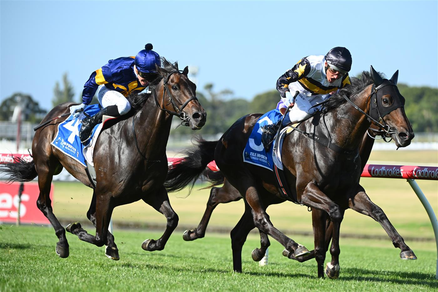MELBOURNE, AUSTRALIA - FEBRUARY 11: Damien Oliver riding Here To Shock defeats Ben Melham riding Munhamek in Race 9, the Tile Importer Handicap, during Melbourne Racing at Sandown Hillside on February 11, 2023 in Melbourne, Australia. (Photo by Vince Caligiuri/Getty Images)