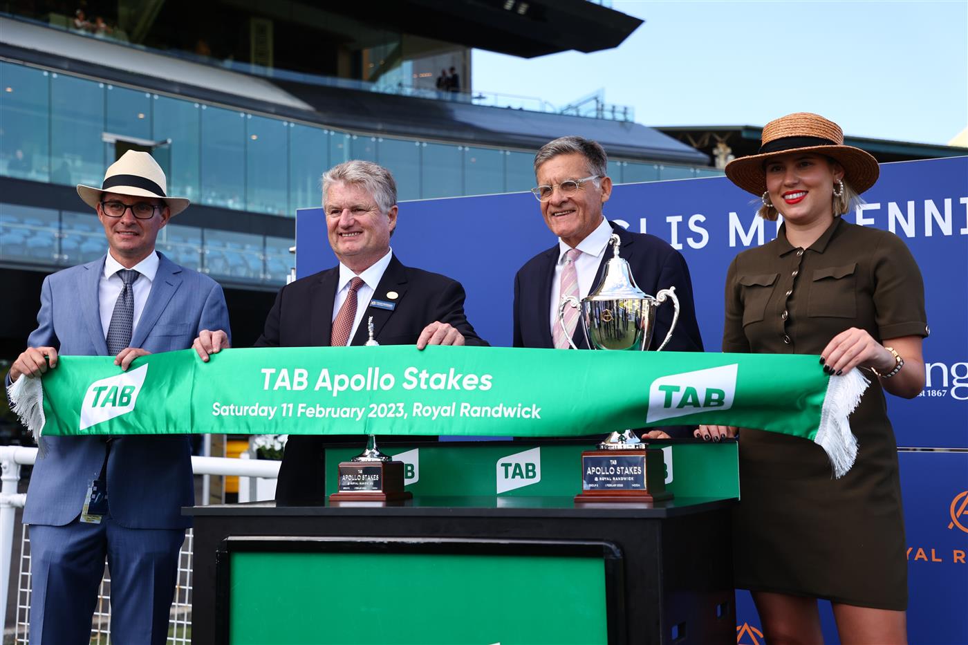 SYDNEY, AUSTRALIA - FEBRUARY 11: Trainers and VIPs celebrate after James Mcdonald riding Anamoe wins Race 8 TAB Apollo Stakes during the Inglis Millennium Day - Sydney Racing at Royal Randwick Racecourse on February 11, 2023 in Sydney, Australia. (Photo by Jeremy Ng/Getty Images)