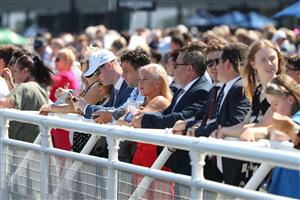 SYDNEY, AUSTRALIA - FEBRUARY 11: Racegoers watch on during the Inglis Millennium Day - Sydney Racing at Royal Randwick Racecourse on February 11, 2023 in Sydney, Australia. (Photo by Jeremy Ng/Getty Images)