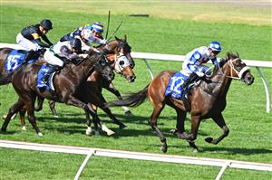 MELBOURNE, AUSTRALIA - FEBRUARY 11: Jamie Kah riding Pounding winning Race 8, The Big Screen Company T.s. Carlyon Cup, during Melbourne Racing at Sandown Hillside on February 11, 2023 in Melbourne, Australia. (Photo by Vince Caligiuri/Getty Images)